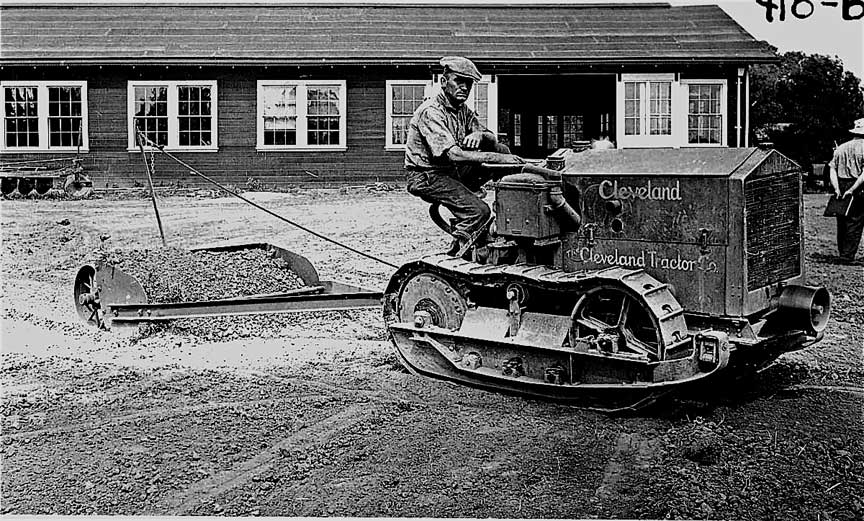 Cleveland H pulling Schweiser Land Leveler